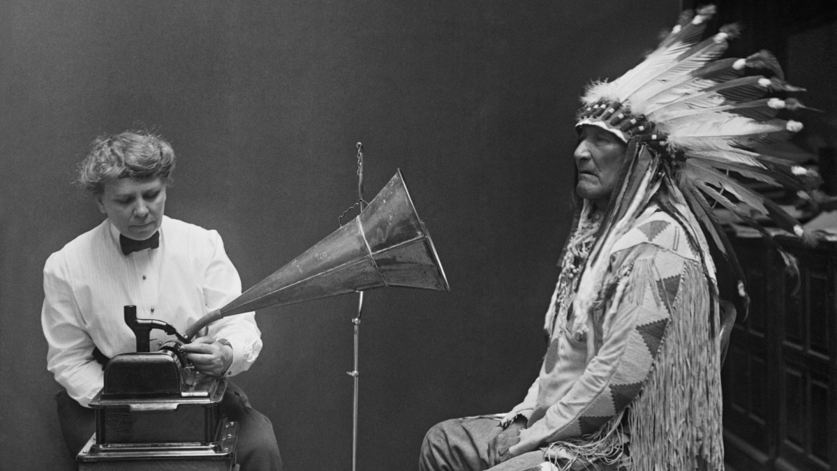 Frances Densmore making a recording of Blackfoot chief Mountain Chief for the Bureau of American Ethnology. "Blackfoot Chief,