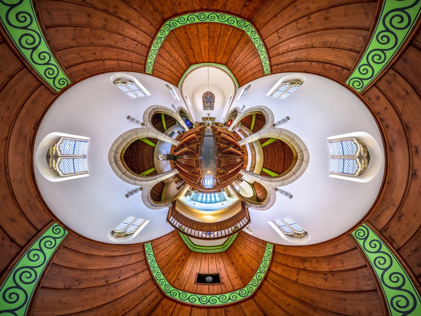 PIC BY ERNST CHRISTEN / CATERS - (Pictured: Church of Tramelan, Switzerland) - These kaleidoscopic panoramas showcase the vibrant beauty of religious places of worship. Snappy by photographer Ernst Christen, the images offer a 360-degree view of churches, chapels, mosques and temples, popping out from teh frame thanks to Ernsts unique technique. In order to create his segmented panoramas, Ernst, 52, captures 26 images - three rows of eight, plus one up and one down - before stitching them together. The photographer, from Solothurn, Switzerland, became interested in this subject matter after moving from a Buddhist forest monastery, in the jungle of Thailand, back to the hyperactive Western world. - SEE CATERS COPY
