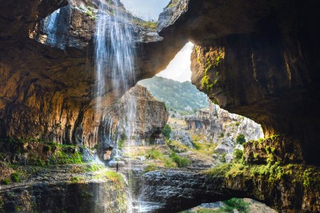 PIC BY RALPH AZAR/ CATERS NEWS - (PICTURED: The three bridge waterfall taken from inside the fall) - These stunning pictures of beautiful waterfalls will take your breath away. The mystical waterfall trickles down through unique circular rock formations, echoing around cavernous gorge. The incredible series of snaps were caught on camera by Ralph Azar and Jack Seikaly, from Beirut, Lebanon, at the Baatara Gorge waterfall, near Tannourine in northern Lebanon. Ralph, 28, said: I tried lots of different angles  I wanted to show the grandeur of this place without actually paying attention to where I was going. SEE CATERS COPY.