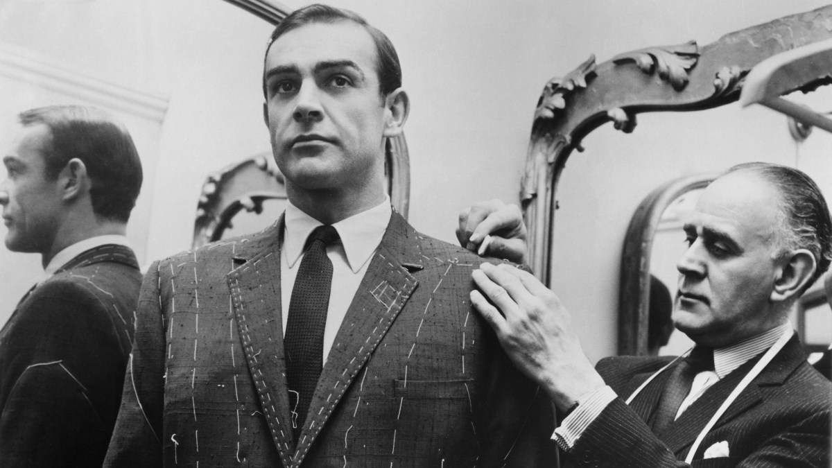 Tailor Anthony Sinclair fitting Scottish actor Sean Connery for one of the suits he will wear in the film 'From Russia With Love', Mayfair, London, 1963. (Photo by United Artists/Archive Photos/Getty Images)