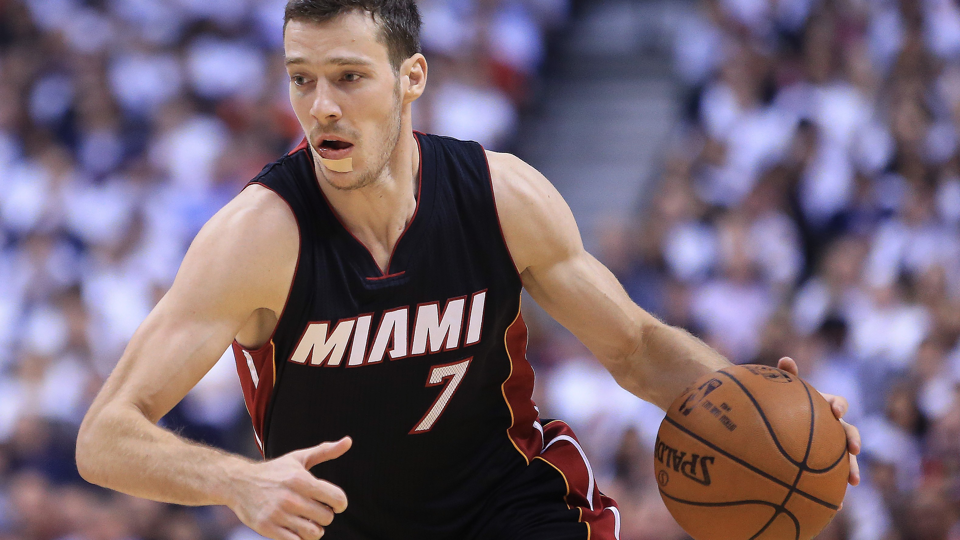 TORONTO, ON - MAY 05: Goran Dragic #7 of the Miami Heat has a band-aid on his chin after being hit in the face by DeMar DeRozan #10 of the Toronto Raptors in the first half of Game Two of the Eastern Conference Semifinals during the 2016 NBA Playoffs at the Air Canada Centre on May 5, 2016 in Toronto, Ontario, Canada. NOTE TO USER: User expressly acknowledges and agrees that, by downloading and or using this photograph, User is consenting to the terms and conditions of the Getty Images License Agreement. (Photo by Vaughn Ridley/Getty Images)