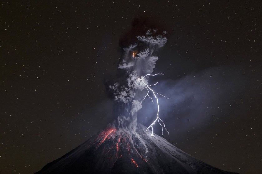 Colima Volcano in Mexico shows a powerful night explosion with lightning, ballystics and some incandescent rockfalls. Photo taken on dec. 13 at 22:24 hours, 12.5 km away from the crater near a lagoon named Carrizalillos on Comala municipality in the state of Colima. Colima Volcano had a period of enormous activity on july of 2015, at least 700 inhabitants were evacuated from their settlements. The volcano mantains activity with 3 to 6 explosions by day. Lightning on Colima Volcano explosions became common on last months. This particular lightning is more than 600 meters long, so the big light made clear some details of the south portion of volcano. It's an 8 seconds shot, time enough to catch the explosion and the lightning. Photo: Sergio Velasco
