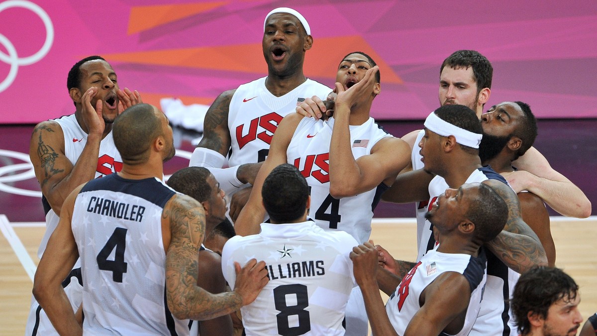 The United States players celebrate winning the Men's Basketball gold medal game at the London 2012 Olympics Games. (Pascal Le Segretain/Getty Images)