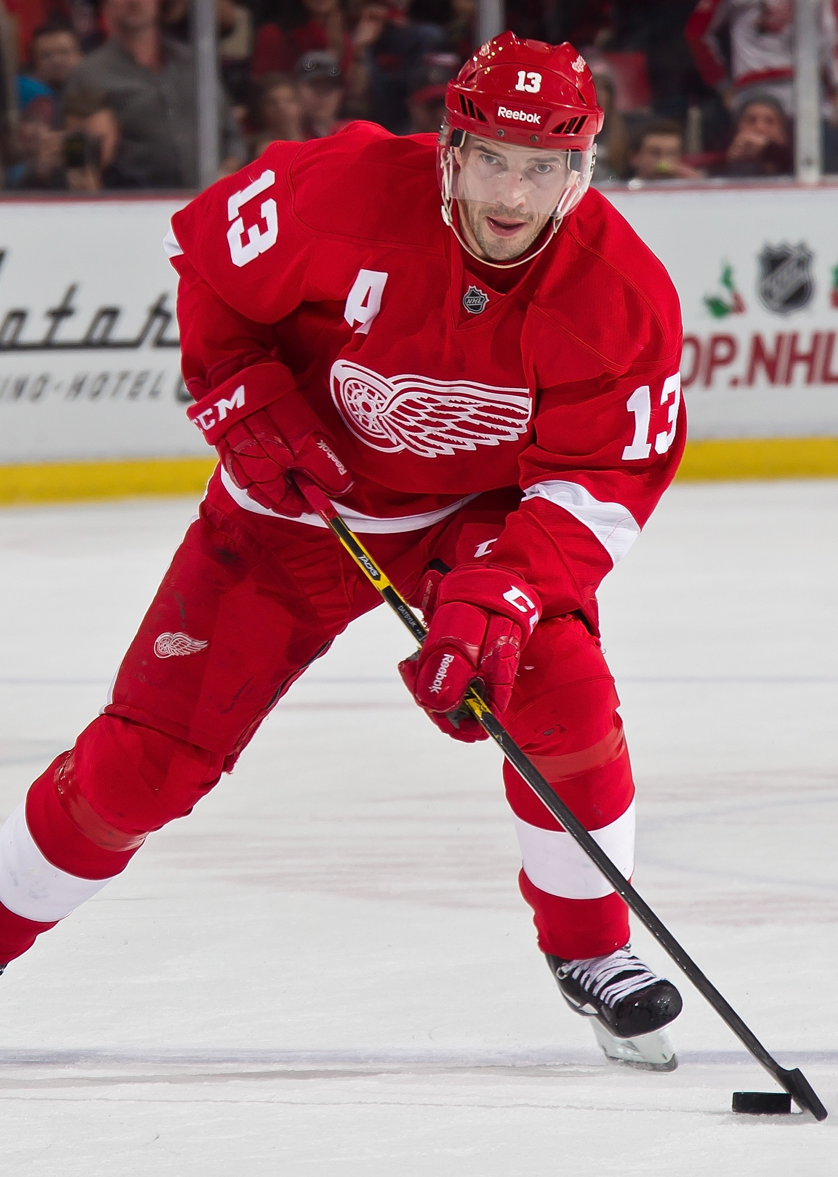 DETROIT, MI - DECEMBER 21: Pavel Datsyuk #13 of the Detroit Red Wings skates in for a shoot-out attempt during a NHL game against the Colorado Avalanche on December 21, 2014 at Joe Louis Arena in Detroit, Michigan. The Avalanche defeated the Wings 2-1 in a shootout (Photo by Dave Reginek/NHLI via Getty Images)