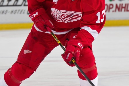 DETROIT, MI - DECEMBER 21: Pavel Datsyuk #13 of the Detroit Red Wings skates in for a shoot-out attempt during a NHL game against the Colorado Avalanche on December 21, 2014 at Joe Louis Arena in Detroit, Michigan. The Avalanche defeated the Wings 2-1 in a shootout (Photo by Dave Reginek/NHLI via Getty Images)