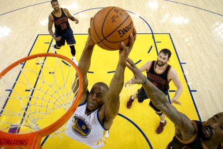 OAKLAND, CA - JUNE 02:  Andre Iguodala #9 of the Golden State Warriors goes up to dunk the ball against J.R. Smith #5 of the Cleveland Cavaliers in the first half in Game 1 of the 2016 NBA Finals at ORACLE Arena on June 2, 2016 in Oakland, California. NOTE TO USER: User expressly acknowledges and agrees that, by downloading and or using this photograph, User is consenting to the terms and conditions of the Getty Images License Agreement.  (Photo by Ezra Shaw/Getty Images)