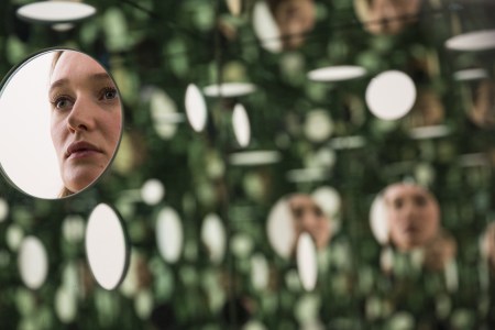 A Tate employee looks into 'The Passing Winter' sculpture by Yayoi Kusama at the Tate Modern's new Switch House. (Jack Taylor/Getty Images)