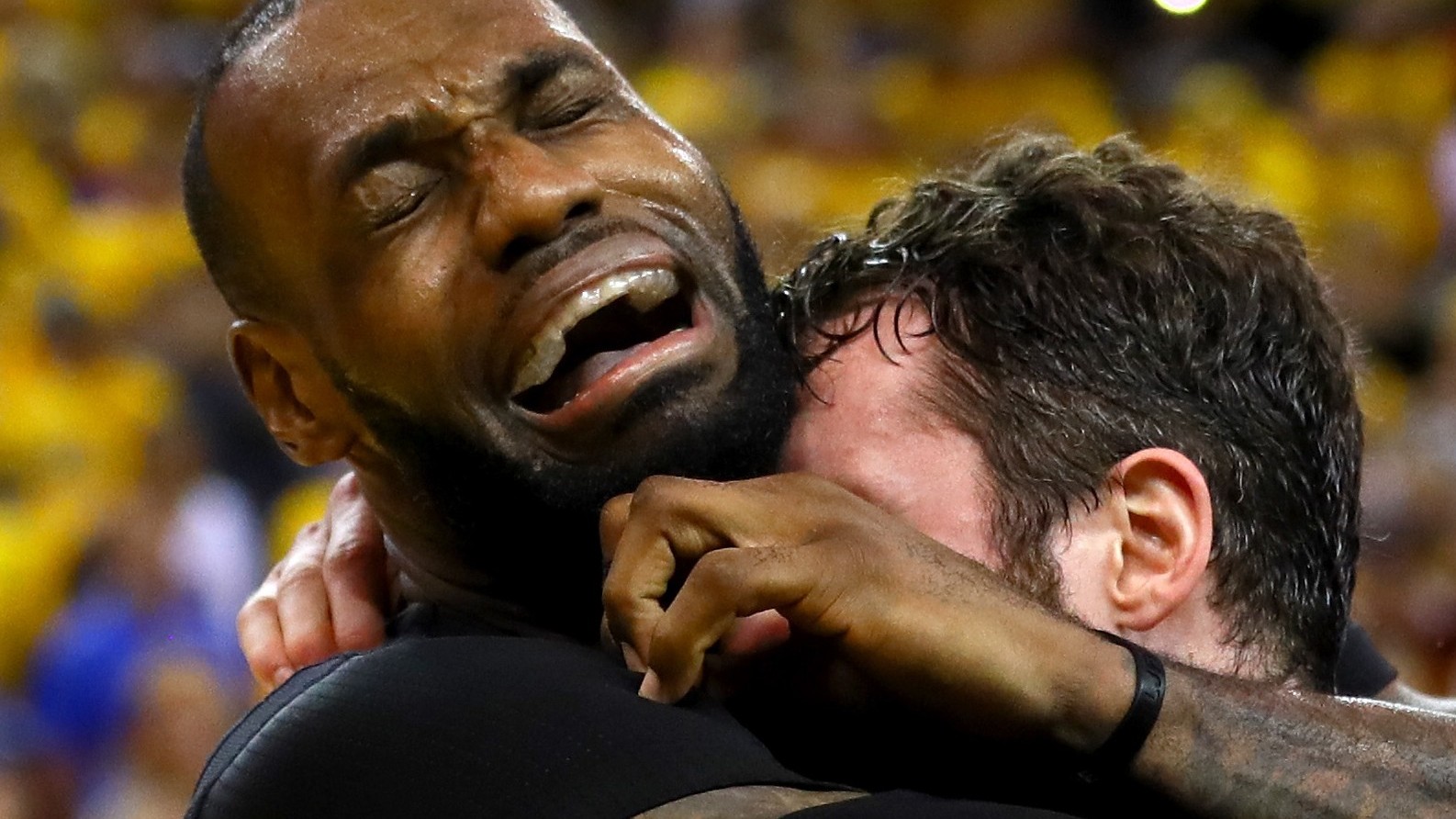 OAKLAND, CA - JUNE 19: LeBron James #23 and Kevin Love #0 of the Cleveland Cavaliers celebrate after defeating the Golden State Warriors 93-89 in Game 7 of the 2016 NBA Finals at ORACLE Arena on June 19, 2016 in Oakland, California. NOTE TO USER: User expressly acknowledges and agrees that, by downloading and or using this photograph, User is consenting to the terms and conditions of the Getty Images License Agreement. (Photo by Ezra Shaw/Getty Images)