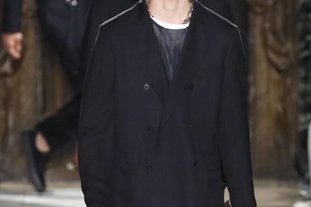 Models present creations by Valentino during the Men's Spring/Summer 2017 collection fashion show on June 22, 2016 in Paris. (Patrick Kovarik/AFP/Getty Images)