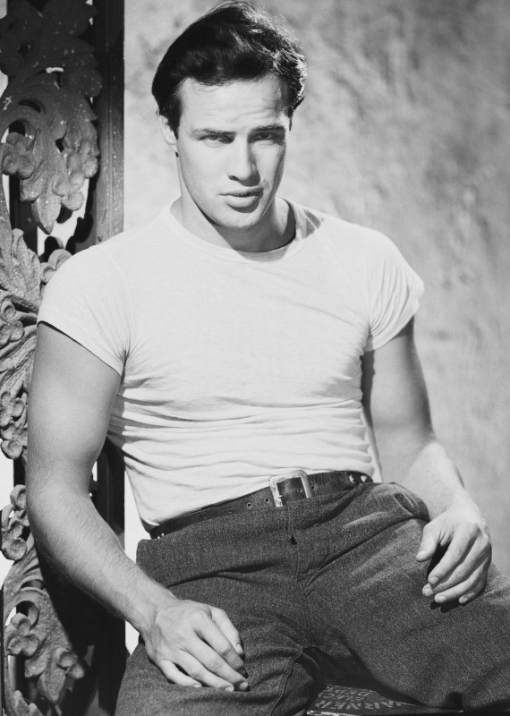 American actor Marlon Brando in character as Stanley Kowalski in the film 'A Streetcar Named Desire', directed by Elia Kazan, 1950.  (Photo via John Kobal Foundation/Getty Images)