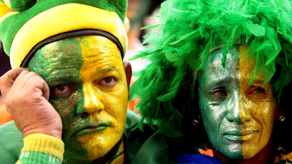 SAO PAULO, BRAZIL - JULY 01: Brazilian supporters weep after their defeat to Netherlands in a match of 2010 FIFA World Cup during a public broadcast at Vale do Anhangabau on July 1, 2010 in Sao Paulo, Brazil. (Photo by Rodrigo Coca/FotoArena/LatinContent/Getty Images)