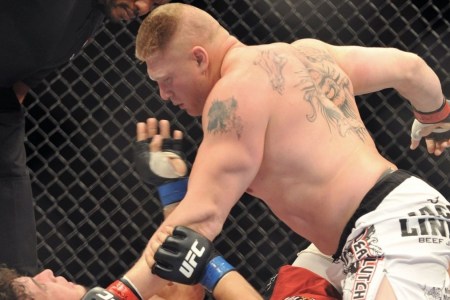 LAS VEGAS - JULY 11:  UFC heavyweights Brock Lesnar (R) battles Frank Mir (L) during their heavyweight title bout during UFC 100 the Mandalay Bay Hotel and Casino on July 11, 2009 in Las Vegas, Nevada.  (Photo by Jon Kopaloff/Getty Images)