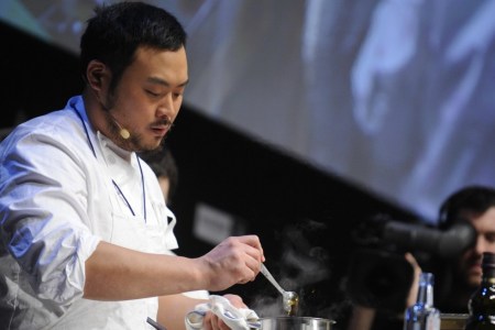 US chef David Chang presents a recipe during the gastronomic fair "Madrid Fusion" on January 21, 2009 in Madrid. Madrid Fusion brings together the world's top chefs for four-days of cooking and and practical tips. AFP PHOTO/ PIERRE-PHILIPPE MARCOU (Photo credit should read PIERRE-PHILIPPE MARCOU/AFP/Getty Images)