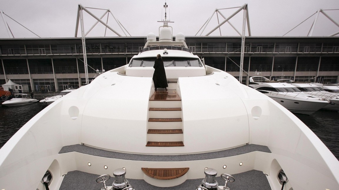 LONDON - JANUARY 05:  A visitor walks around the deck of the largest British built 37 metre yacht, The Snapper, at the Boat Show on January 5, 2007 in London. The Boat show runs for ten days and has over 1000 boats on display.  (Photo by Peter Macdiarmid/Getty Images)