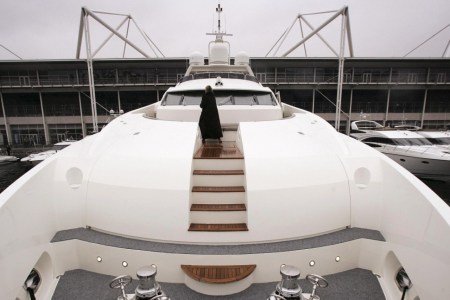 LONDON - JANUARY 05:  A visitor walks around the deck of the largest British built 37 metre yacht, The Snapper, at the Boat Show on January 5, 2007 in London. The Boat show runs for ten days and has over 1000 boats on display.  (Photo by Peter Macdiarmid/Getty Images)
