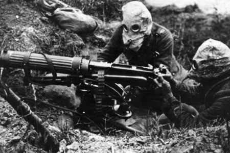 Gas-masked men of the British Machine Gun Corps with a Vickers machine gun during the first battle of the Somme. (General Photographic Agency/Getty Images)
