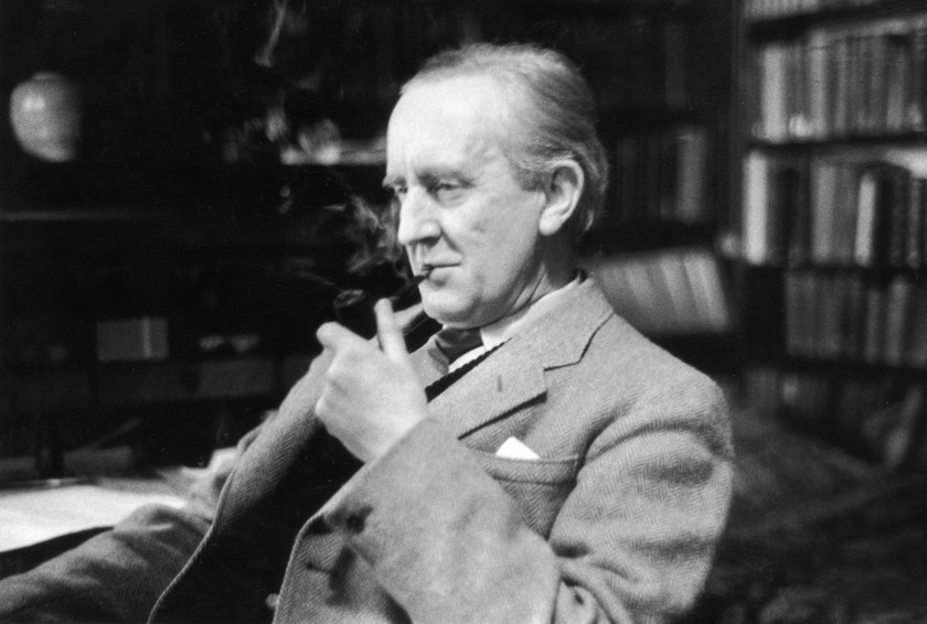British writer J R R Tolkien enjoying a pipe in his study at Merton College in Oxford. (Haywood Magee/Picture Post/Getty Images)
