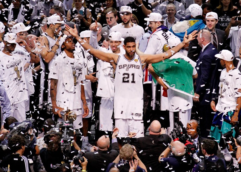 SAN ANTONIO, TX - JUNE 15: Tim Duncan #21 of the San Antonio Spurs celebrates after defeating the Miami Heat in Game Five of the 2014 NBA Finals at the AT&T Center on June 15, 2014 in San Antonio, Texas. NOTE TO USER: User expressly acknowledges and agrees that, by downloading and or using this photograph, User is consenting to the terms and conditions of the Getty Images License Agreement. (Photo by Chris Covatta/Getty Images)
