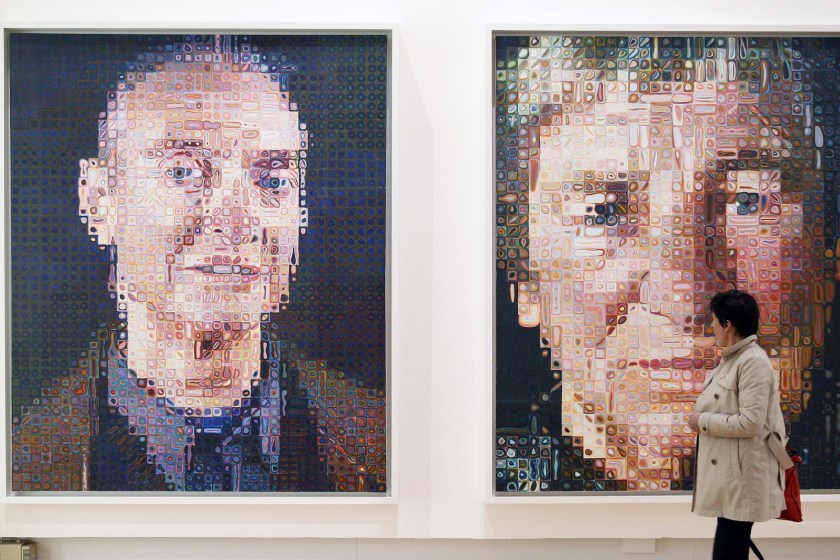 A Visitor looks at paintings by US artist Chuck Close entitled 'Roy I' and 'Agnes'during the press opening of the exhibition 'Icones Americaines' (American Icons) at the Grand Palais on April 07, 2015 in Paris, France. The exhibition runs from April 8 to June 22. (Chesnot/Getty Images)