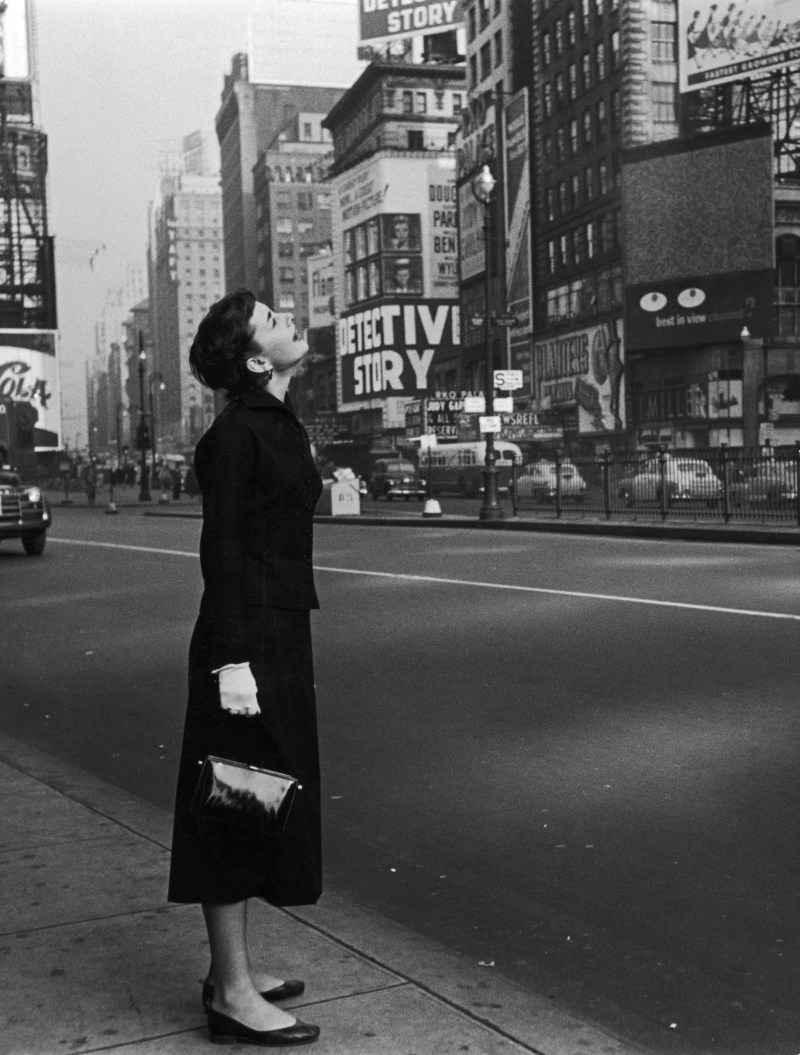 Actress Audrey Hepburn looking up at billboards in middle of Times Square, recently in town for run of Broadway show Gigi, in which she is starring. (The LIFE Picture Collection/Getty Images)