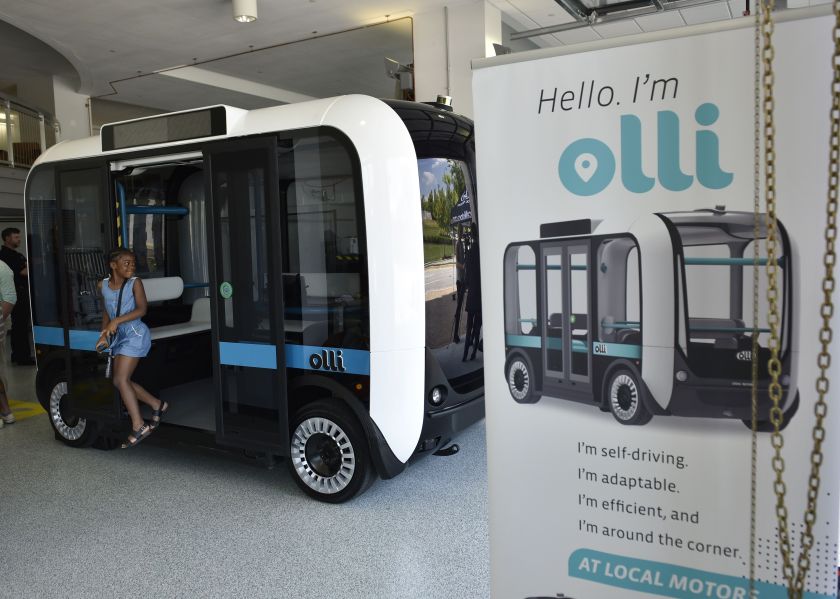 "Olli" an autonomous shuttle is seen at the Local Motors facility at the National Harbor in Maryland on June 16, 2016. The electric self-driving shuttle is partnership between Local Motors and IBM, using IBM's Watson supercomputer. / AFP / Mandel Ngan (Photo credit should read MANDEL NGAN/AFP/Getty Images)