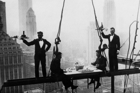 (GERMANY OUT) NEW YORK: WALDORF-ASTORIA. Construction workers having lunch on a suspended I-beam during the construction of the present day Waldorf-Astoria Hotel on Park Avenue at 49th Street, New York. Photograph, c1930. (Photo by ullstein bild/ullstein bild via Getty Images)