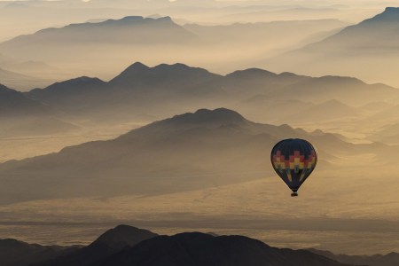 Hot air ballon over the Namib desert (Jonathan & Angela Scott/AWL Images/Creative RM/Getty Images)