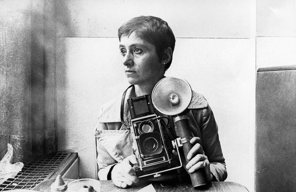 NEW YORK, NY - CIRCA 1968:  Photographer Diane Arbus poses for a rare portrait in the Automat at Sixth Avenue between 41st & 42nd Street  in New York, New York circa 1968. (Photo by Roz Kelly/Michael Ochs Archives/Getty Images)