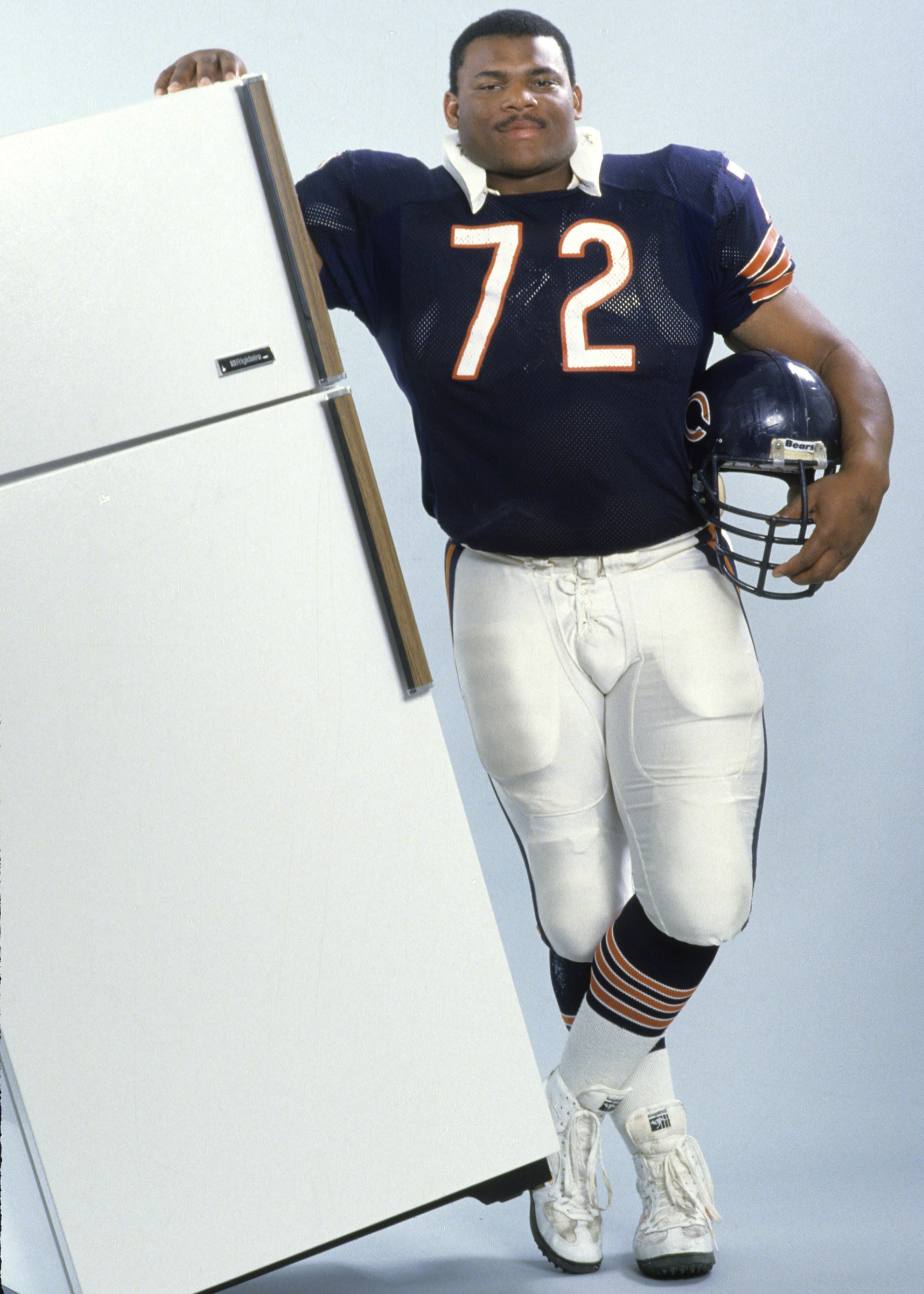 William Perry, Chicago Bears defensive tackle aka, William " Refrigerator" Perry poses with a refrigerator. (Photo by Bill Smith/Getty Images)