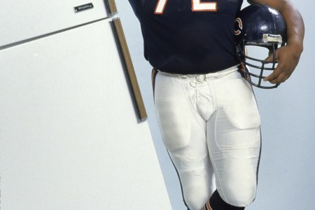William Perry, Chicago Bears defensive tackle aka, William " Refrigerator" Perry  poses with a refrigerator. (Photo by Bill Smith/Getty Images)