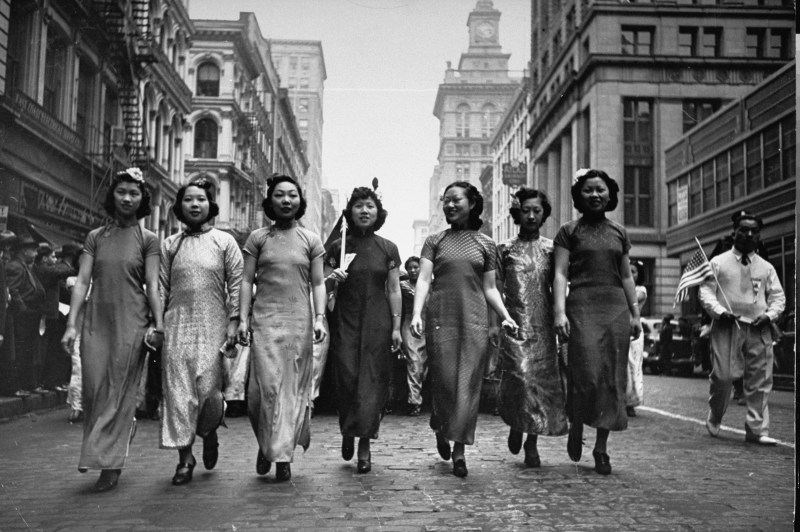 Women in traditional clothing walking in Chinese parade. (Peter Stackpole/The LIFE Picture Collection/Getty Images)