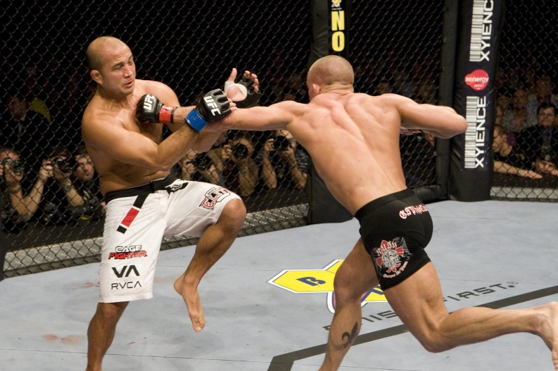 LAS VEGAS - JANUARY 31: Georges St-Pierre (black shorts) def. BJ Penn (white shorts) - TKO - 5:00 round 4 during UFC 94 at MGM Grand Arena on January 31, 2009 in Las Vegas, Nevada. (Photo by Josh Hedges/Zuffa LLC via Getty Images)