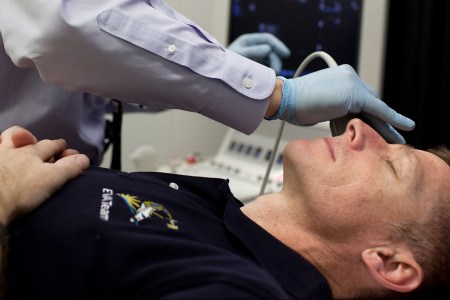 NASA astronaut Chris Ferguson, STS-135 commander, has his eyes imaged using ultrasound as he undergoes an eye examination  at the Johnson Space Center Flight Medicine Clinic on Friday, March 11, 2011, in Houston.  (NASA Photo / Houston Chronicle, Smiley N. Pool)