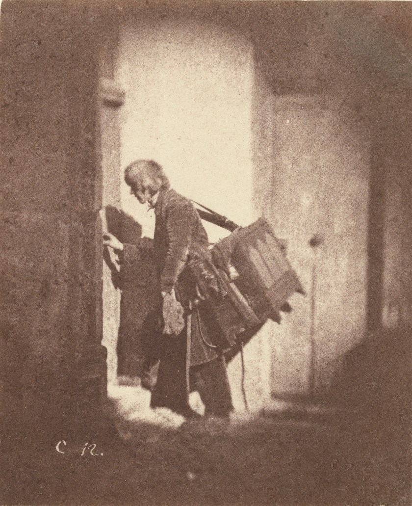 Organ Grinder at 21, quai Bourbon, Ile Saint-Louis, Paris, 1853 (Charles Nègre/he J. Paul Getty Museum, Los Angeles)