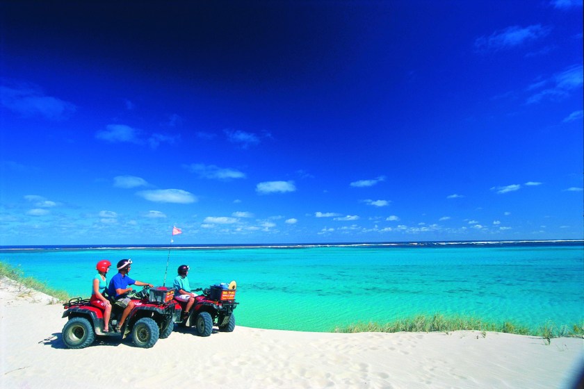 Tourists on quad bikes at Coral Bay (Courtesy Western Australia Tourism)