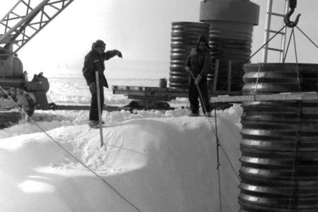 A crane lowers a hatch into a lateral trench of the permanent camp at Camp Century in Greenland. (Photo by Pictorial Parade/Archive Photos/Getty Images)
