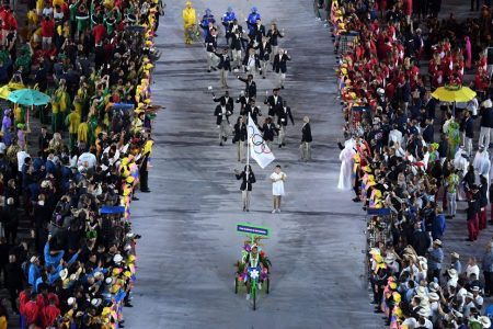 The Olympic Refugee team enter the athletes parade during the Opening Ceremony of the Rio 2016 Olympic Games at Maracana Stadium on August 5, 2016 in Rio de Janeiro, Brazil.  (Richard Heathcote/Getty Images)
