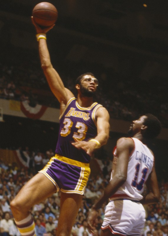 PHILADELPHIA - 1982: Kareem Abdul-Jabbar #33 of the Los Angeles Lakers shoots a skyhook over a player of the 76ers during the 1982 NBA finals at the Spectrum in Philadelphia, Pennsylvania. (Photo by Focus on Sport/Getty Images)
