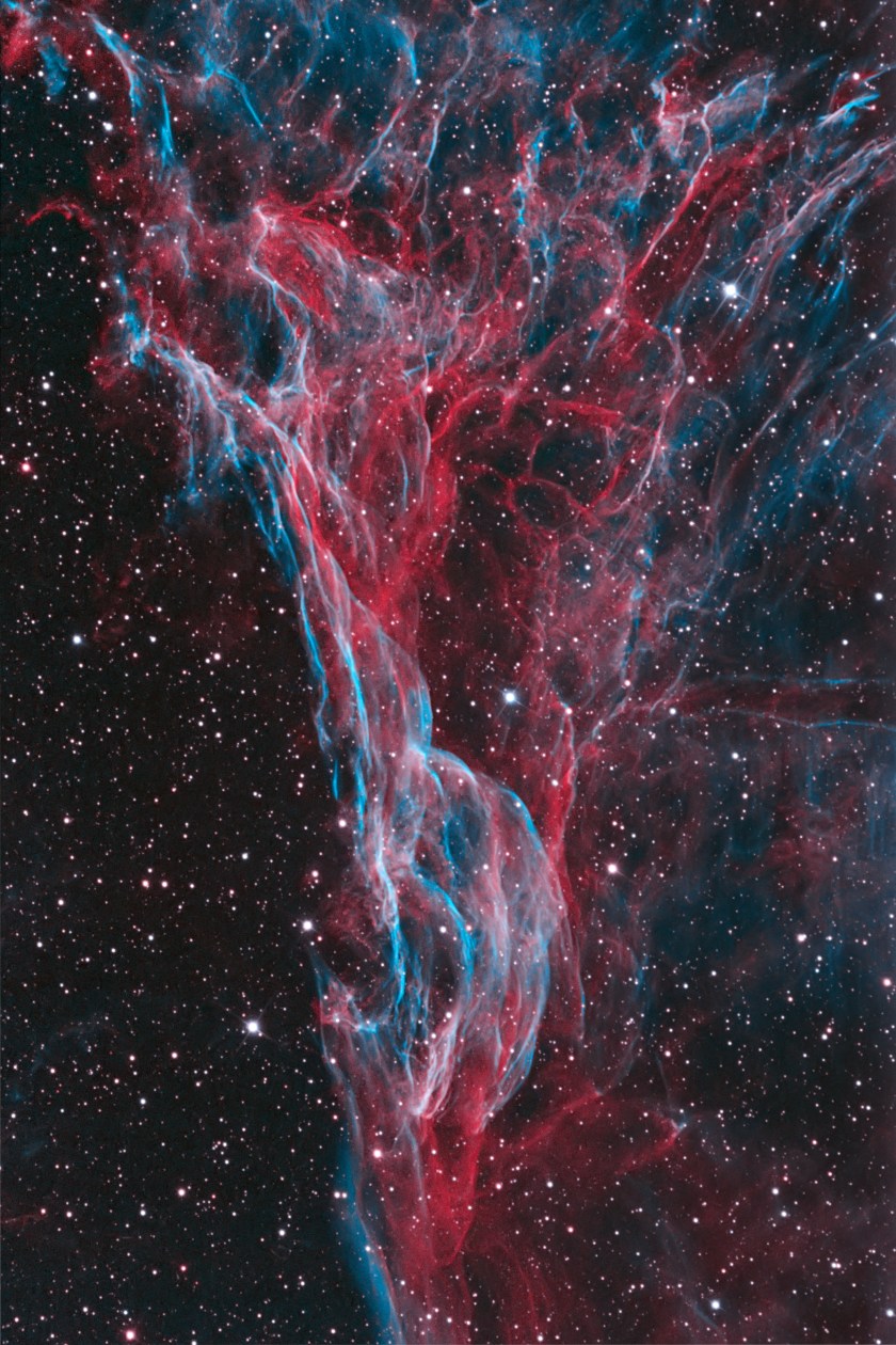 The luminous tangle of filaments of Pickering’s Triangle intertwines through the night sky. Located in the Veil Nebula, it is one of the main visual elements of a supernova remnant, whose source exploded around 8,000 years ago. (Bob Franke)