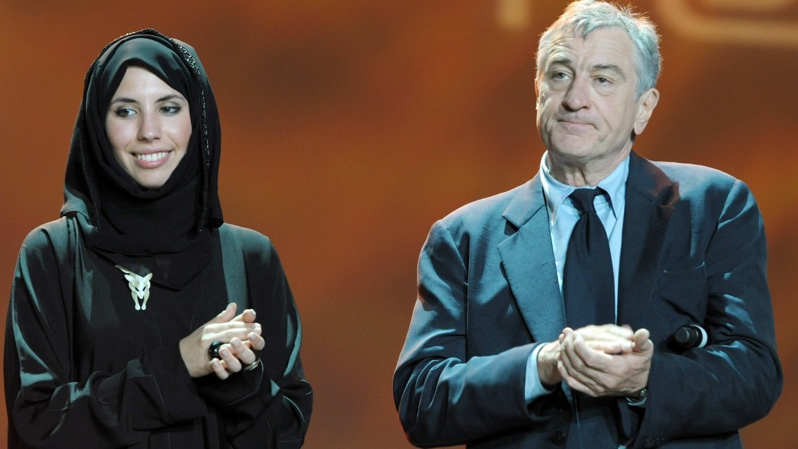 DOHA, QATAR - NOVEMBER 01:  Sophia Al-Maria and Tribeca Film Festival Co-founder Robert De Niro speak onstage at the DTFF Closing Night Ceremony at the Museum of Islamic Art during the 2009 Doha Tribeca Film Festival on November 1, 2009 in Doha, Qatar.  (Photo by Michael Buckner/Getty Images for Doha Tribeca Film Festival)