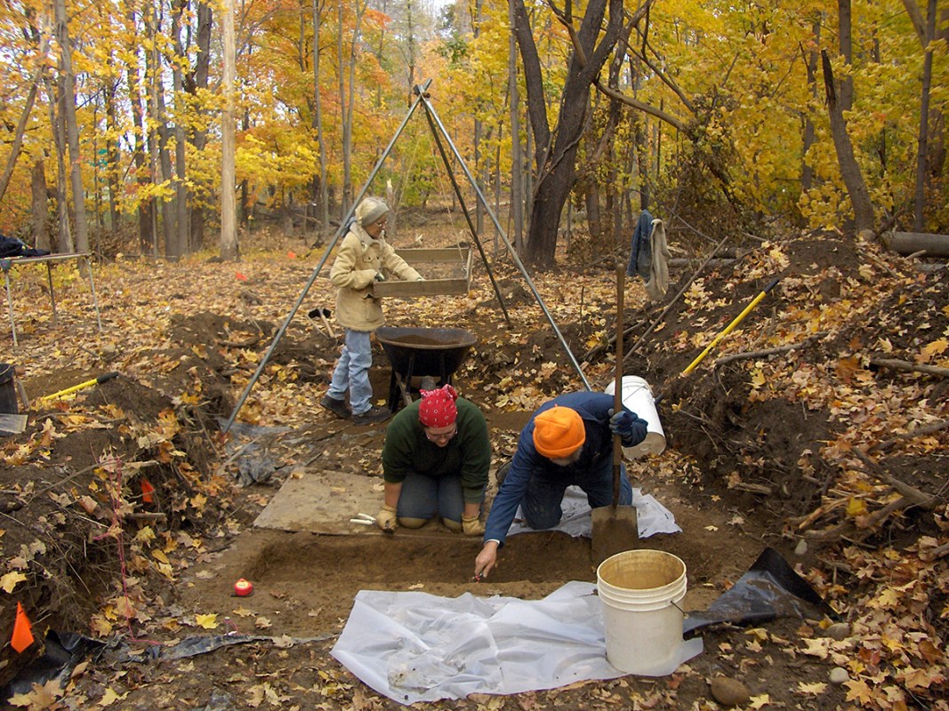Archaeologists William Sandy and Antonella Inserra dig a grave shaft while Paula Crowley works the tripod sifter. (Friends of the Fishkill Supply Depot)