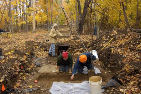 Archaeologists William Sandy and Antonella Inserra dig a grave shaft while Paula Crowley works the tripod sifter. (Friends of the Fishkill Supply Depot)