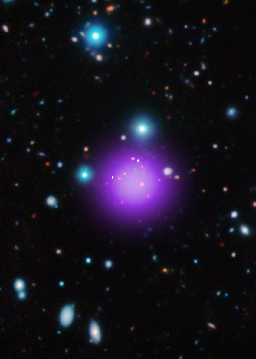 This image contains the most distant galaxy cluster, a discovery made using data from NASA’s Chandra X-ray Observatory and several other telescopes. The galaxy cluster, known as CL J1001+0220, is located about 11.1 billion light years from Earth and may have been caught right after birth, a brief, but important stage of cluster evolution never seen before. (NASA)