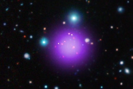 This image contains the most distant galaxy cluster, a discovery made using data from NASA’s Chandra X-ray Observatory and several other telescopes. The galaxy cluster, known as CL J1001+0220, is located about 11.1 billion light years from Earth and may have been caught right after birth, a brief, but important stage of cluster evolution never seen before. (NASA)