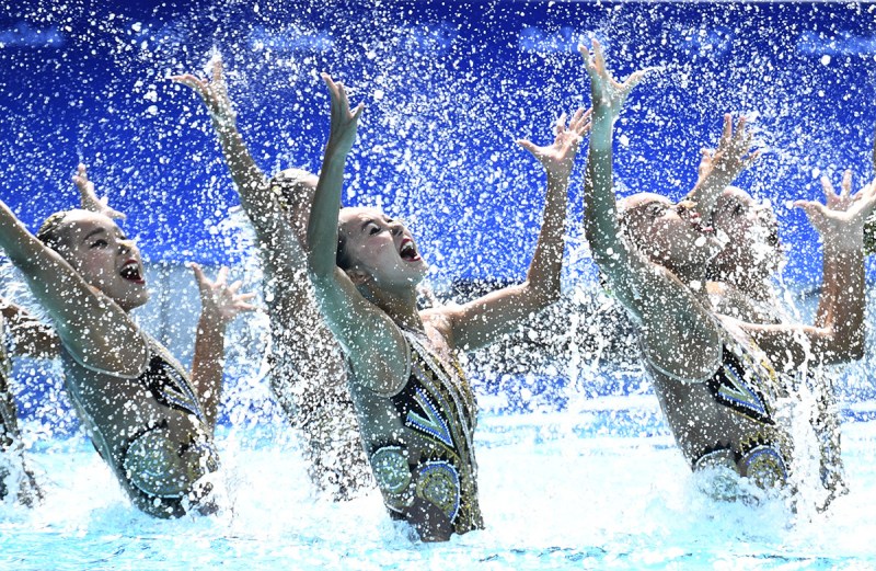Team China competes in the Teams Technical Routine Final during the synchronised swimming event. (Martin Bureau/AFP/Getty Images)