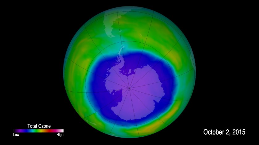 This image, using data from NOAA and NASA satellites, shows the ozone layer from two perspectives. In the global map, blue colors indicate normal levels of ozone and red colors indicate the area associated with the ozone hole. The vertical profile in green colors shows how the actual thickness of the ozone layer changes. Very low levels and thicknesses of ozone were measured on Oct. 2, 2015. This depletion was consistent with balloon sonde measurements from the same time. (NOAA)