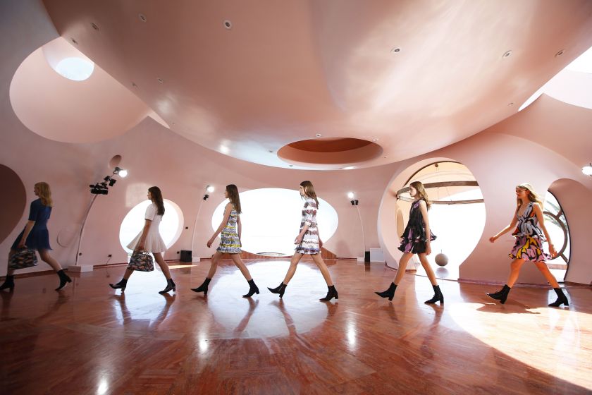 Models present creations by Belgian fashion designer Raf Simons during the Dior 2016 cruise collection show, on May 11, 2015 at the Palais Bulle in Theoule-sur-Mer, southeastern France. (Valery Hache/AFP/Getty Images)