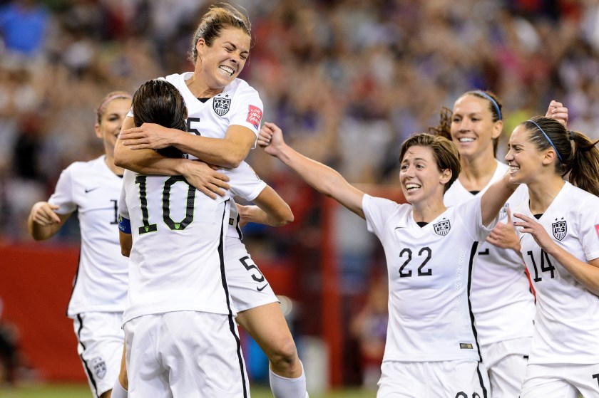Kelley O'Hara #5 of the United States celebrates with teammates after scoring a goal in the second half against Germany in the FIFA Women's World Cup 2015 Semi-Final Match at Olympic Stadium on June 30, 2015 in Montreal, Canada. (Photo by Minas Panagiotakis/Getty Images)