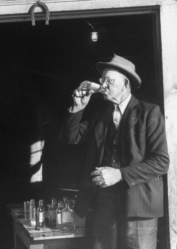 Tasters testing whiskey at the Jack Daniels distillery.  (Photo by Ed Clark/The LIFE Picture Collection/Getty Images)
