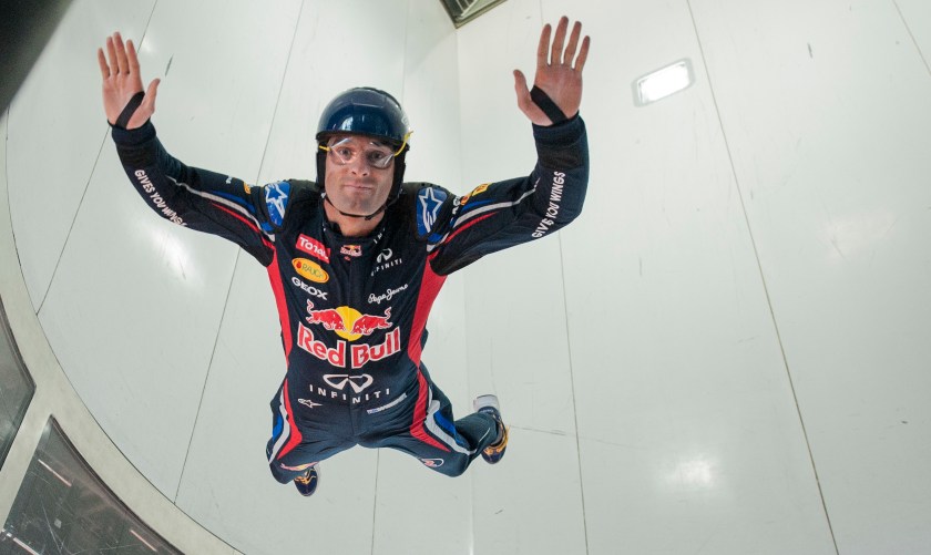 Red Bull Racing driver Mark Webber of Australia practices indoor skydiving in a vertical wind tunnel. (Victor Fraile/Corbis via Getty Images)